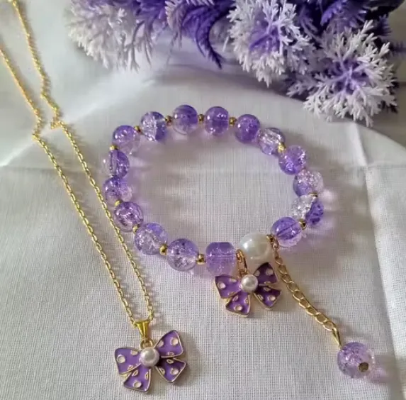 Purple bow charm pandent and chain and bracelets for gift only woman and girls